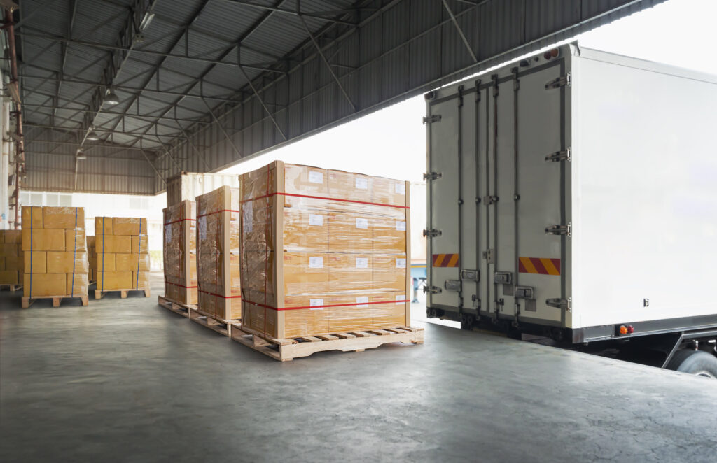 Packaging Boxes Wrapped Plastic Stacked on Pallets Loading into Cargo Container