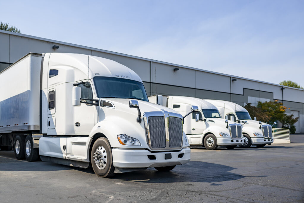 Industrial long hauler carriers white big rig semi trucks tractors
