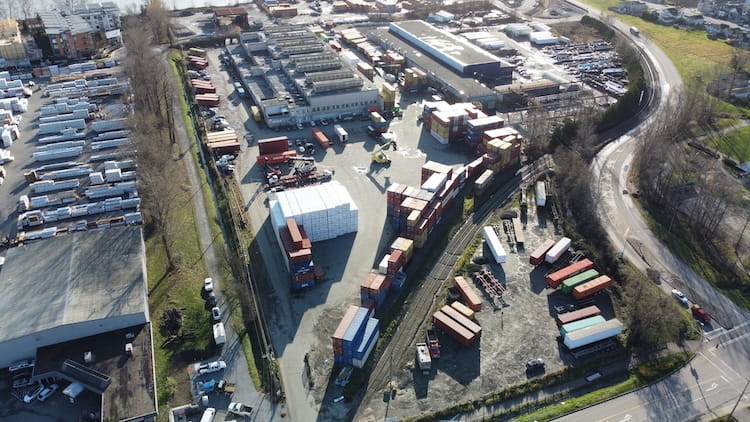Aerial view of WTC Group's Ewen Terminal with lots of shipping containers and trucks.